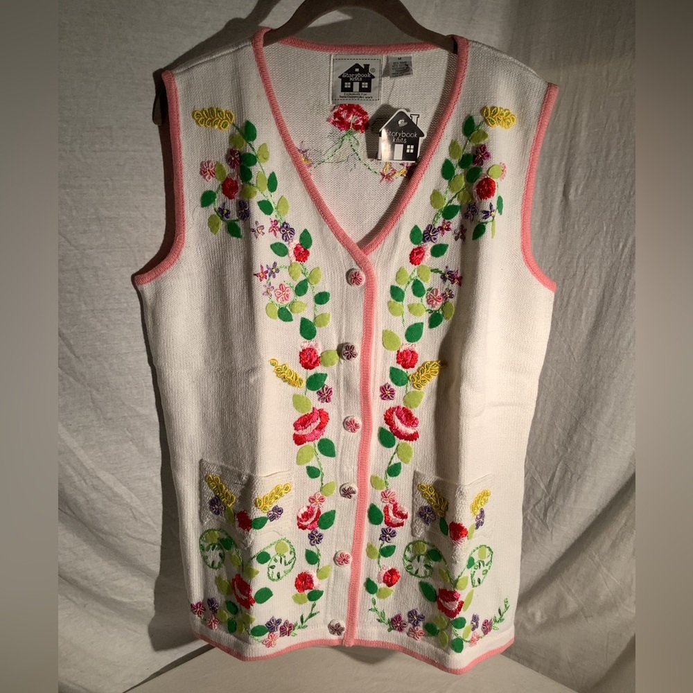 Storybook knit vest titled “Enchanted Garden”